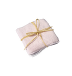 multiples lingettes blanche et rose avec un noeud de raphia